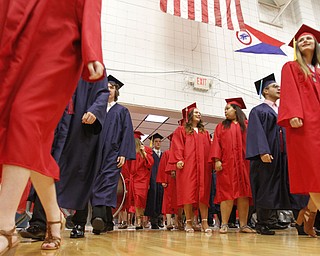             ROBERT  K. YOSAY | THE VINDICATOR..Austintown Fitch High School graduated over 300 students in the Fitch Gym Saturday morning as the graduation season is coming to a close..Pomp and Circumstances as the students enter the gym