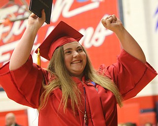             ROBERT  K. YOSAY | THE VINDICATOR..Austintown Fitch High School graduated over 300 students in the Fitch Gym Saturday morning as the graduation season is coming to a close..YEP YEP YEP.. Megan Blackburn   celebrates her  diploma with friends and family in the stands