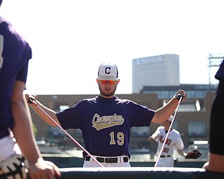 Champion Golden Flashes left fielder Drake Batcho (19) stretches before Champion takes on Berlin Hiland in the DIII baseball championship, Saturday, June 3, 2017 at Huntington Park in Columbus. Champion won 1-0...(Nikos Frazier | The Vindicator)