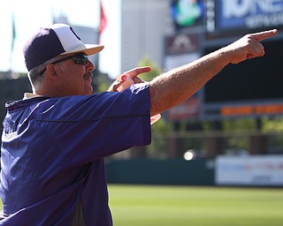 Champion coach Rick Yauger pumps up the crowd before Champion takes on Berlin Hiland in the DIII baseball championship, Saturday, June 3, 2017 at Huntington Park in Columbus. Champion won 1-0...(Nikos Frazier | The Vindicator)