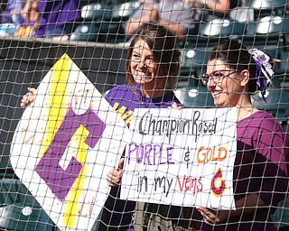 Coach Yauger's daughters hold up signs before Champion takes on Berlin Hiland in the DIII baseball championship, Saturday, June 3, 2017 at Huntington Park in Columbus. Champion won 1-0...(Nikos Frazier | The Vindicator)