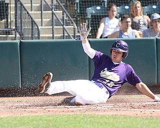 Champion Golden Flashes shortstop Lucas Nasonti (15) slides into home plate for a run in the first inning as Champion takes on Berlin Hiland in the DIII baseball championship, Saturday, June 3, 2017 at Huntington Park in Columbus. Champion won 1-0...(Nikos Frazier | The Vindicator)
