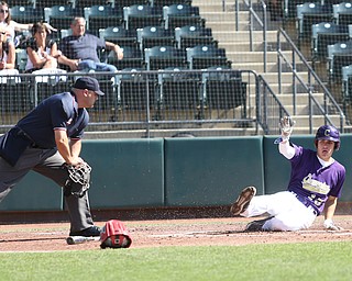 Champion Golden Flashes shortstop Lucas Nasonti (15) slides into home plate for a run in the first inning as Champion takes on Berlin Hiland in the DIII baseball championship, Saturday, June 3, 2017 at Huntington Park in Columbus. Champion won 1-0...(Nikos Frazier | The Vindicator)