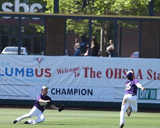Champion Golden Flashes shortstop Lucas Nasonti (15) and Champion Golden Flashes center fielder Will Kovach (3) look up for a ball in the second inning as Champion takes on Berlin Hiland in the DIII baseball championship, Saturday, June 3, 2017 at Huntington Park in Columbus. Champion won 1-0...(Nikos Frazier | The Vindicator)