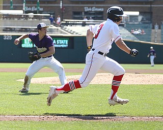 Champion Golden Flashes pitcher Andrew Russel (28) looks to throw to first as Hiland Hawks runner Andy Miller(3) runs to first in the fourth inning as Champion takes on Berlin Hiland in the DIII baseball championship, Saturday, June 3, 2017 at Huntington Park in Columbus. Champion won 1-0...(Nikos Frazier | The Vindicator)