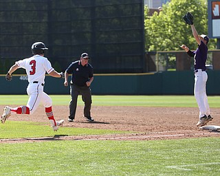 Champion Golden Flashes second baseman Justin Taninecz (2) jumps up to out Hiland Hawks runner Andy Miller (3) in the fourth inning as Champion takes on Berlin Hiland in the DIII baseball championship, Saturday, June 3, 2017 at Huntington Park in Columbus. Champion won 1-0...(Nikos Frazier | The Vindicator)
