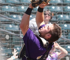 Champion Golden Flashes catcher Michael Turner (10) opens up for the out on a hit in the fifth inning as Champion takes on Berlin Hiland in the DIII baseball championship, Saturday, June 3, 2017 at Huntington Park in Columbus. Champion won 1-0...(Nikos Frazier | The Vindicator)