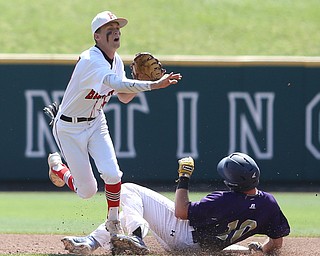 Hiliard second baseman Chris Kline (24) opens up for the catch to out Champion Golden Flashes catcher Michael Turner (10) in the sixth inning as Champion takes on Berlin Hiland in the DIII baseball championship, Saturday, June 3, 2017 at Huntington Park in Columbus. Champion won 1-0...(Nikos Frazier | The Vindicator)