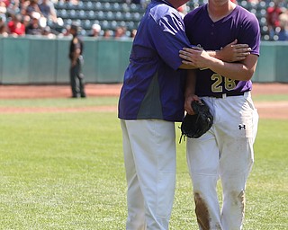 Champion coach Rick Yauger and Champion Golden Flashes pitcher Andrew Russel (28) celebrate their victory after defeating Berlin Hiland, 1-0 in the DIII baseball championship, Saturday, June 3, 2017 at Huntington Park in Columbus. Champion won 1-0...(Nikos Frazier | The Vindicator)