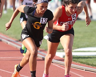 Anita Mancini(710) of Canfield and Shynae Deas(502) of Lincoln competesin the DI girls 800 meter run final during the 2017 OHSAA Boys and Girls State Track and Field Tournaments, Saturday, June 3, 2017 at the Jesse Owens Memorial Stadium in Columbus...(Nikos Frazier | The Vindicator)