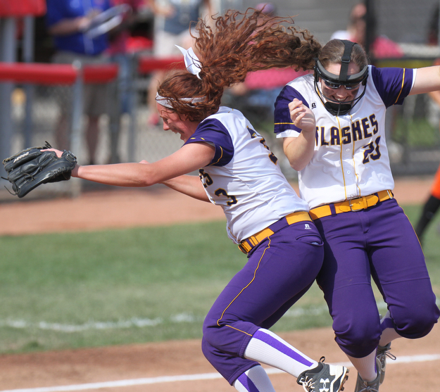 William D. Lewis The Vindicator  Champions McKenzie Zigmont, left, and Abbi White react during state championship win in Akron 6-3-17.