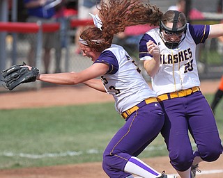 William D. Lewis The Vindicator  Champions McKenzie Zigmont, left, and Abbi White react during state championship win in Akron 6-3-17.