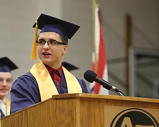             ROBERT  K. YOSAY | THE VINDICATOR..Austintown Fitch High School graduated over 300 students in the Fitch Gym Saturday morning as the graduation season is coming to a close..Speaking from the heart with no prepareded speech  Jacob Rodesh thanks his parents