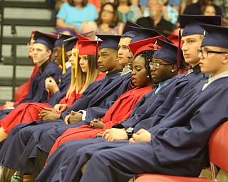             ROBERT  K. YOSAY | THE VINDICATOR..Austintown Fitch High School graduated over 300 students in the Fitch Gym Saturday morning as the graduation season is coming to a close..diverse graduates as they Listen to the principal Christopher Berni