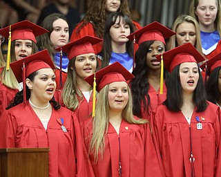             ROBERT  K. YOSAY | THE VINDICATOR..Austintown Fitch High School graduated over 300 students in the Fitch Gym Saturday morning as the graduation season is coming to a close..Last time they sing as graduates join the choir and sing "For Good" by Stephen Schwartz