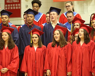             ROBERT  K. YOSAY | THE VINDICATOR..Austintown Fitch High School graduated over 300 students in the Fitch Gym Saturday morning as the graduation season is coming to a close..Last time they sing as graduates join the choir and sing "For Good" by Stephen Schwartz