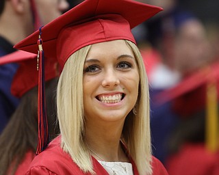             ROBERT  K. YOSAY | THE VINDICATOR..Austintown Fitch High School graduated over 300 students in the Fitch Gym Saturday morning as the graduation season is coming to a close..MakenzieZets (ok) turns and smiles at friends and family...