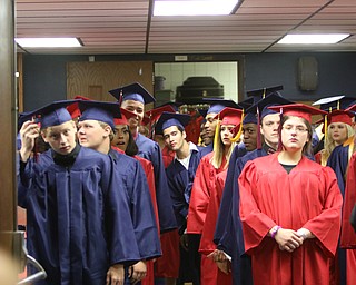             ROBERT  K. YOSAY | THE VINDICATOR..Austintown Fitch High School graduated over 300 students in the Fitch Gym Saturday morning as the graduation season is coming to a close. Students waiting to enter the gym at the start of services