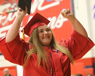             ROBERT  K. YOSAY | THE VINDICATOR..Austintown Fitch High School graduated over 300 students in the Fitch Gym Saturday morning as the graduation season is coming to a close..YEP YEP YEP.. Megan Blackburn   celebrates her  diploma with friends and family in the stands