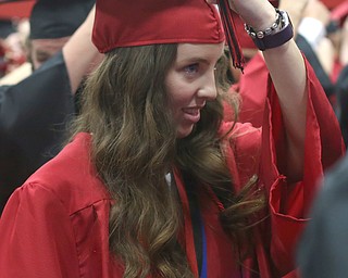 Hannah Harlan turns her tassel during the Canfield High School commencement, Sunday, June 4, 2017 in Canfield...(Nikos Frazier | The Vindicator)