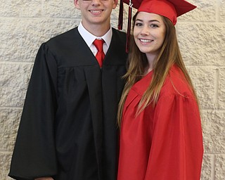 Tyler Napolitano and Alexandria Viano pose for photos after the Canfield High School commencement, Sunday, June 4, 2017 in Canfield...(Nikos Frazier | The Vindicator)