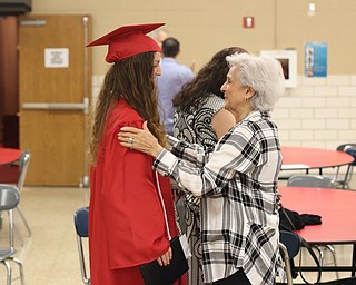 Paije Georgeoff talks with her grandmother, Nancy Georgeoff after the Canfield High School commencement, Sunday, June 4, 2017 in Canfield...(Nikos Frazier | The Vindicator)