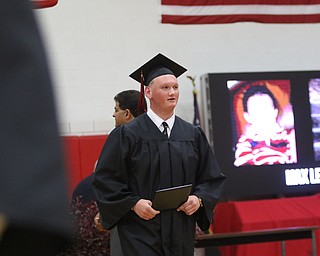             ROBERT  K. YOSAY | THE VINDICATOR..Canfield High School Gym  as class of 2017 graduates.Nick Zizzo   returns to his seat.