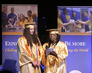             ROBERT  K. YOSAY | THE VINDICATOR..Valley Christian graduated over 50 students  at Highway Tabernacle Church in Austintown Sunday afternoon...Singing the alma mater at the end of the ceremony as Laura Sylvester and Shelbi Clay (ok)