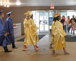             ROBERT  K. YOSAY | THE VINDICATOR..Valley Christian graduated over 50 students  at Highway Tabernacle Church in Austintown Sunday afternoon...The class starts its walk to commencement