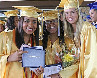             ROBERT  K. YOSAY | THE VINDICATOR..Valley Christian graduated over 50 students  at Highway Tabernacle Church in Austintown Sunday afternoon...All smiles as  Marissa Davis  Shelbi (ok) Clay and Tess Emerson...