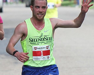 William D Lewis The Vindicator  Youngstown Marathon winner Tony Migliozzi of North Canton