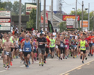 William D Lewis The Vindicator  Runners at start of Youngstown Marathon 6-4-17 on Rt 224 in Baordman.