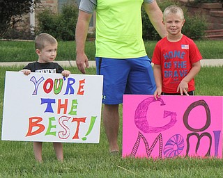 William D Lewis The Vindicator BrothersDerek, 3, left, and Logan Whitman,6, cheer on their mom Cassie Whitman of Canfield during Youngstown Marathon 6-4-17 on Rt 224 in Boardman.