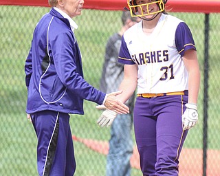William D Lewis The Vindicator Champion's Molly Williams(31) of the Trumbull team gets congrats from coach Cheryl Weaver after slamming a triple in 1rst inning  during 1rst game of 14th annual Bill Sferra Softball Classic at YSU 6-6-17.