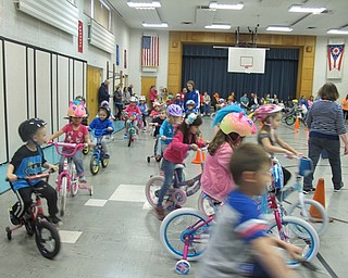 Neighbors | Alexis Bartolomucci.Poland North Preschool students rode their bicycles on May 5 for the St. Jude Trike-a-Thon .fundraiser.
