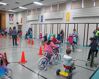 Neighbors | Alexis Bartolomucci.Parents and grandparents came to watch the students ride their bicycles around the gym at Poland North Preschool for the St. Jude Trike-a-Thon.