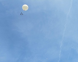 Neighbors | Alexis Bartolomucci.The weather balloon launched into the sky on May 10 by the Austintown Middle School STEM students at the Austintown Fitch football field.