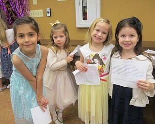 Neighbors | Alexis Bartolomucci.Girls waited in the other room at Boardman Park as they prepared to walk the runway during the Mommy and Me for Tea Fashion Show.