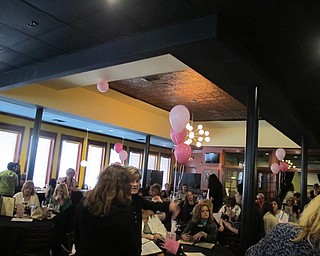 Neighbors | Alexis Bartolomucci.The Magic Tree Pub and Eatery was filled with guests supporting the Piggyback Foundation of Youngstown during the second Chocolate Fest on May 11.