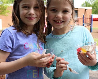 Neighbors | Abby Slanker.Two C.H. Campbell Elementary School first-graders ate their ice cream sundaes during the school’s annual Student Appreciation Day on May 19.