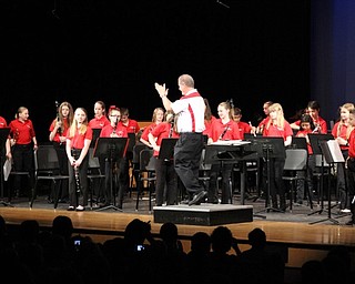 Neighbors | Abby Slanker.Canfield Village Middle School band director James Volenik applauded the fifth-grade band at the end of their performance at the annual spring concert at the Canfield High School on May 16.