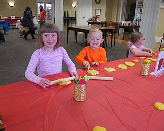 Neighbors | Alexis Bartolomucci.Aubrey and Christopher Vokish played with Play-Doh during the Be Our Guest event at the Poland library celebrating the "Beauty and the Beast" movie.
