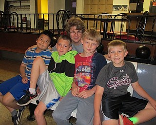 Neighbors | Alexis Bartolomucci.Doreen Miner, fourth-grade teacher, bowled with some of her students during the Robinwood Lane Elementary fourth grade bowling trip on May 24.