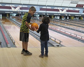 Neighbors | Alexis Bartolomucci.Max helped out his classmate, Bridget, during their field trip to Boardman Lanes on May 24 for Robinwood Lane Elementary and Stadium Drive.