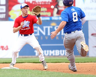 Trumbull County second baseman Ryan Love(17)(Hubbard) opens up for the catch as Mahoning County runner Pad O'Shaughnessy(8)(Poland) nears second during the 1st inning in the 2017 High School Valley All Star Classic, Friday, June 9, 2017 at Eastwood Field. Trumbull County won 8-6...(Nikos Frazier | The Vindicator)..
