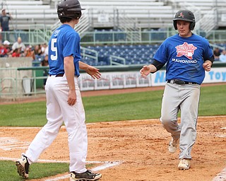 Mahoning County runners Jack Bajerski(5)(South Range) and Mark Wittman(10)(Canfield) celebrate their runs during the 6th inning in the 2017 High School Valley All Star Classic, Friday, June 9, 2017 at Eastwood Field. Trumbull County won 8-6...(Nikos Frazier | The Vindicator)..