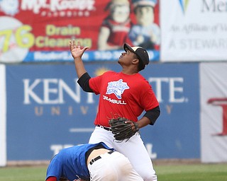Trumbull County second baseman Grant Williams(28)(Harding) looks up at the ball after Mahoning County runner John Medvec(7)(Struthers) slide safe into second during the 6th inning in the 2017 High School Valley All Star Classic, Friday, June 9, 2017 at Eastwood Field. Trumbull County won 8-6...(Nikos Frazier | The Vindicator)..