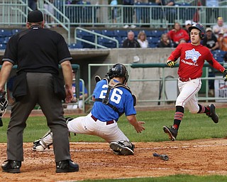 Trumbull County runner Anthony Oulton(8)(Mathews) slides into home as Mahoning County catcher Coleman Stauffer(26)(Boardman) during the 8th inning in the 2017 High School Valley All Star Classic, Friday, June 9, 2017 at Eastwood Field. Trumbull County won 8-6...(Nikos Frazier | The Vindicator)..