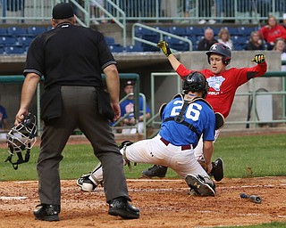 Trumbull County runner Anthony Oulton(8)(Mathews) slides into home as Mahoning County catcher Coleman Stauffer(26)(Boardman) during the 8th inning in the 2017 High School Valley All Star Classic, Friday, June 9, 2017 at Eastwood Field. Trumbull County won 8-6...(Nikos Frazier | The Vindicator)..