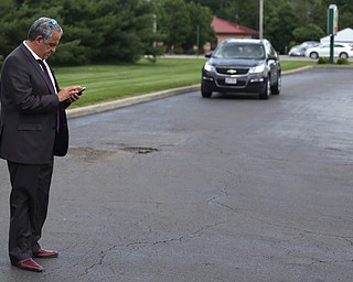 David Betras, Chairman of the Mahoning County Democratic Party, waits for Democratic National Committee (DNC) chairman Tom Perez to speak at Wedgewood Pizza, Friday, June 9, 2017 in Boardman. Perez visited Ohio two days after President Donald Trump spoke in Cincinnati, which Perez stopped in on Thursday...(Nikos Frazier | The Vindicator)